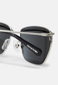 Swarovski Sončna očala - black