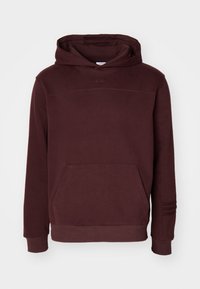 Bordeauxhuppari, joka on valmistettu pehmeästä kankaasta. Siinä on etutasku, ribbatut hihat ja sävy sävyyn logo rinnassa sekä vuorattu huppu.