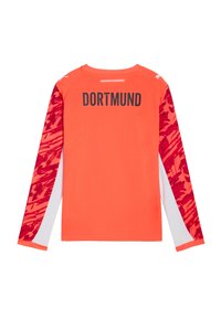 Oranssi pitkähihainen paita, jonka selkäpuolella on mustalla painettuna "DORTMUND". Hihnoissa on punainen graafinen kuvio ja valkoisia korostuksia.