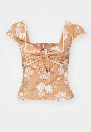Brown floral top with short puff sleeves, square neckline, tie front detail, elastic smocking, and lace trim accents. Features purple and white flowers.