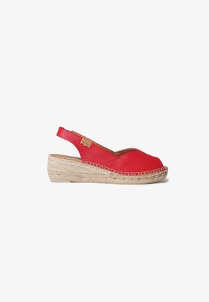 Crvene kožne espadrile na platformi s remenom oko pete, s potplatom od jute i otvorenim prstima, s ušivenim detaljem duž ruba.