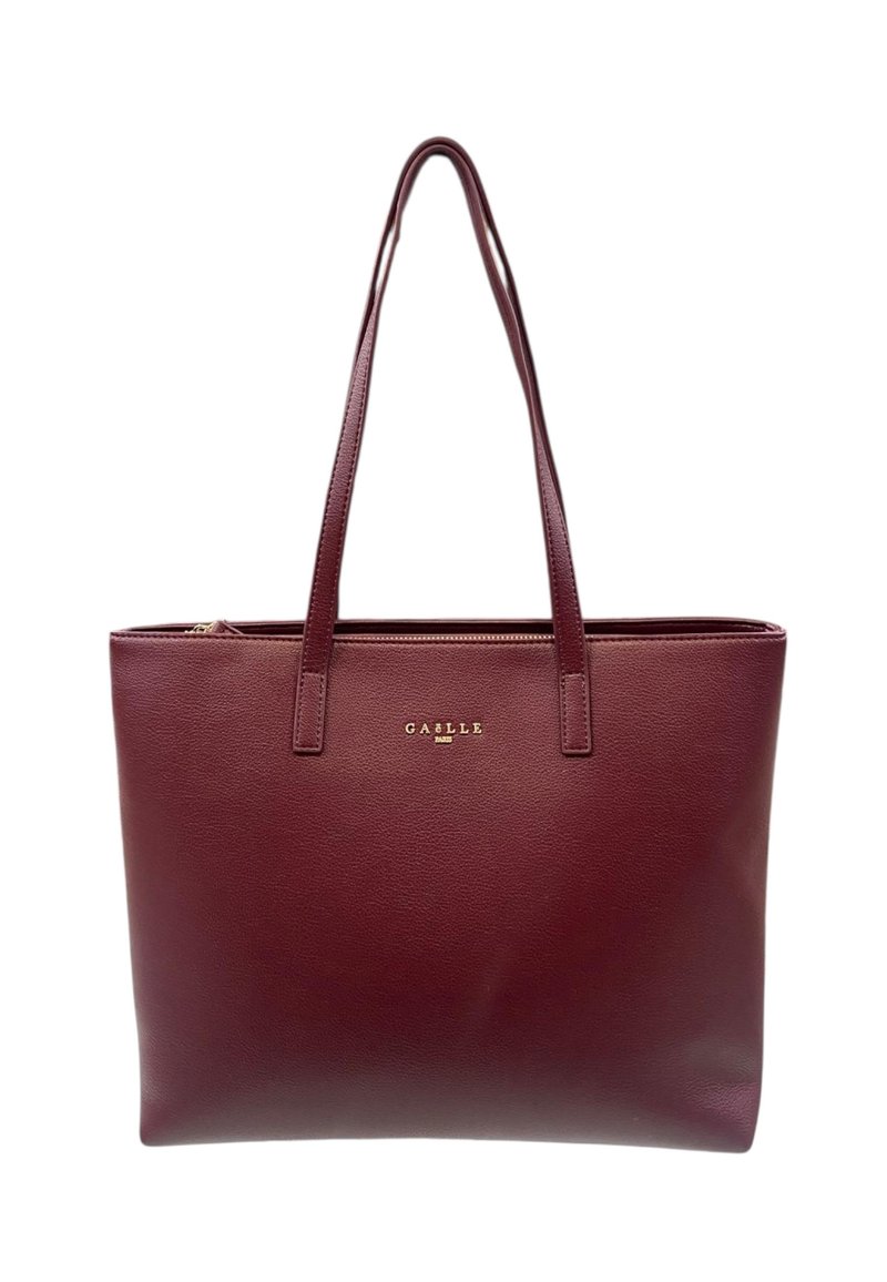 Borsa tote in pelle di un rosso scuro con due lunghe cinghie e un piccolo logo dorato "GAËLLE PARIS" posizionato al centro, vicino alla parte superiore.
