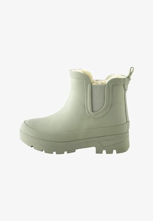 Zielone gumowe botki za kostkę z elastycznym panelem bocznym, teksturowaną podeszwą i miękką, ciepłą wyściółką. Gruba gumowa konstrukcja o solidnej budowie.
