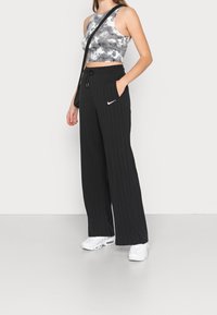 Nike Sportswear Träningsbyxor - black