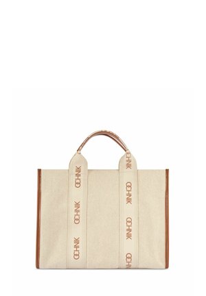 Beżowa płócienna torba typu tote z brązowymi skórzanymi krawędziami, wyposażona w dwa szerokie uchwyty z nadrukiem "OCHNIK" w brązowych literach.