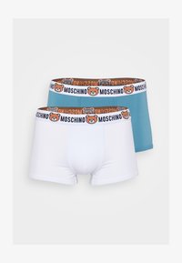 Unselected, azzurro polvere/bianco