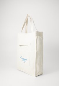 Canvas tote bag, cream color, with a front zippered pocket. Features blue text that says "ICECREAM PLEASE." Sturdy handles.