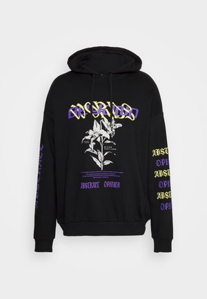 Sweat à capuche noir avec graphisme floral blanc, texte superposé jaune et violet, et texte répété "Abstract Opinion" sur les manches et le devant.