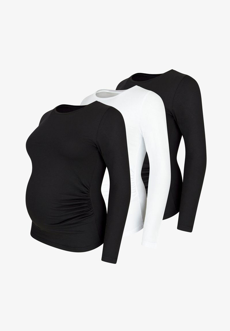 Drei langärmlige Umstandsmode-Oberteile: zwei in Schwarz und eines in Weiß. Mit gerafften Seitennähten und einem weichen, dehnbaren Stoff.