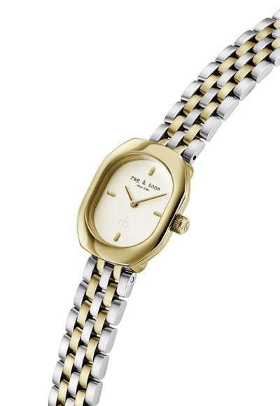 Montre-bracelet à maillons en métal doré et argenté avec un cadran crème, des repères minimalistes et le logo « rag & bone New York » sur le cadran.