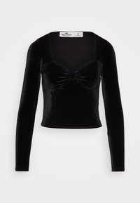 Επιλέχθηκε, casual black