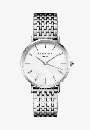 Montre en argent avec un bracelet en acier inoxydable et un cadran en nacre blanche. Design simple et minimaliste avec des marqueurs d'heure fins.