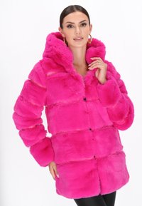 Faux fur coat in bright pink with a full hood, button closure, and wide, plush sleeves. Features a puffy square design with soft texture.