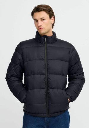 Black insulated puffer jacket with a high collar, horizontal quilted pattern, front zipper, and side pockets. Smooth, water-resistant material.