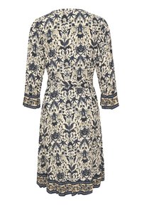 Robe à motif floral en crème et marine, avec des manches trois quarts, une taille cintrée et un ourlet festonné avec des détails intriqués.