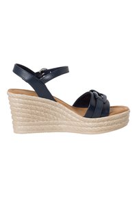Sandalo a zeppa in pelle blu navy con due cinturini incrociati, una soletta ammortizzata e suola in corda di giuta beige intrecciata.