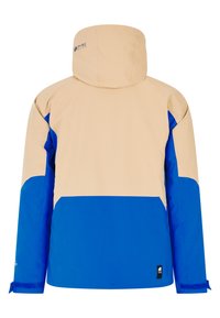 Spalvų blokų striukė, turinti smėlio spalvos viršutinę dalį su mėlynomis rankovėmis ir apvadu. Pagaminta iš lygaus audinio, ji turi gobtuvą ir reguliuojamus rankogalius.