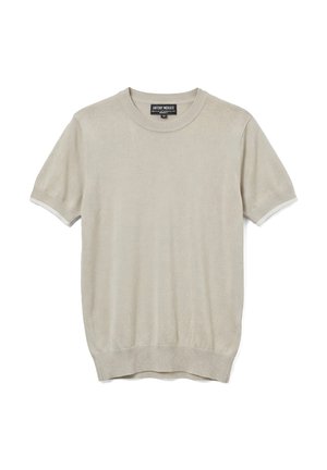 Maglione beige a maniche corte in maglia con collo, polsini e orlo a coste, con etichetta nera del marchio all'interno del collo posteriore.