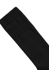 Calzino nero a coste fino al ginocchio con motivo testurizzato e bordo elastico superiore per una vestibilità sicura. Tessuto liscio su tutta la superficie.