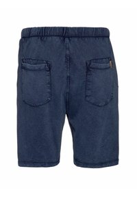 Pantaloni corti blu navy con cintura elastica, due tasche posteriori e una texture in denim morbido. Design semplice senza motivi o accenti visibili.