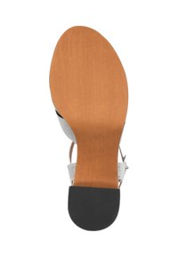 Sandalo con cinturini e tacco piatto. La parte superiore è in materiale sintetico grigio. La soletta presenta una finitura in legno marrone chiaro. Suola in gomma nera per una migliore aderenza.