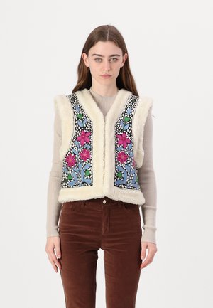 Faux fur vest in cream with floral embroidery in pink and blue on a black background. The design features a V-neck and sleeveless cut.