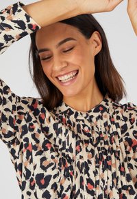 Damart Tuniek - beige animalier