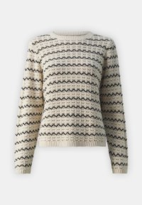 Maglione lavorato a maglia con una base crema e strisce zigzag nere, colletto a coste e polsini a coste, e una texture a trama aperta.