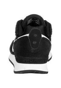 Black athletic shoe with a suede and mesh upper, white accents, a padded collar, and textured rubber sole. Two circular details on the heel.