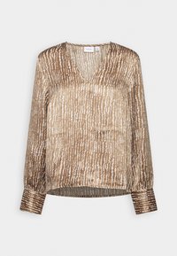 Blouse texturée marron et blanche avec un décolleté en V, des manches longues et des poignets froncés. Présente un motif rayé et un fini doux et brillant.