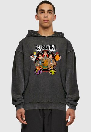 Charcoal hoodie featuring "SCOOBYNATURAL" graphic with cartoon characters, circular accents, and a relaxed fit. Soft fabric with ribbed cuffs.