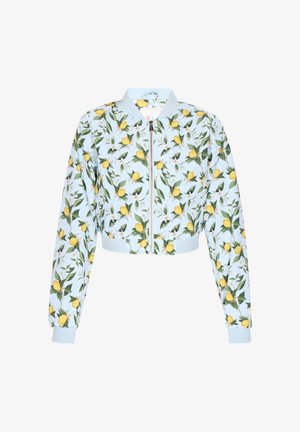 Világoskék bomberdzseki citrom- és levélmintával, rövidített fazonnal, cipzáras záródással, bordázott mandzsettákkal és aljjal. Arany színű fém kiegészítőkkel.