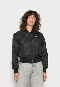 Calvin Klein Jeans REVERSIBLE - Blusão aviador - black