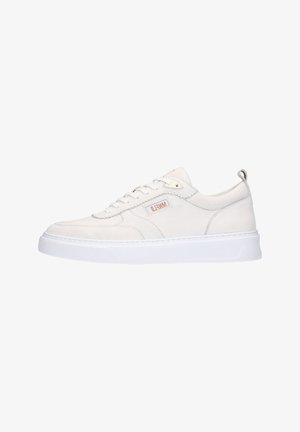 White sneaker with smooth leather upper, padded collar, and textured overlays. Features a flat white rubber sole and side branding detail.