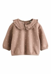 Sweat à manches longues de couleur marron clair avec un col à volants, des motifs de cœurs roses et des poignets et un ourlet élastiqués. Fermeture par boutons au dos. Texture douce.