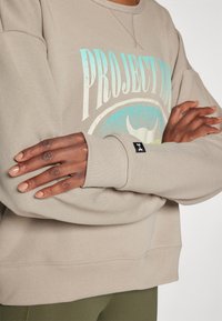 Under Armour TERRY - Felpa - timberwolf taupe/yellow/black