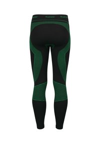 Schwarze Leggings mit grünen Streifenakzenten. Verfügt über ein eng anliegendes Design und einen elastischen Bund, geeignet für sportliche Aktivitäten. Strukturierter, atmungsaktiver Stoff.