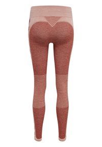 Röda sömlösa leggings med texturerade mönstrade sektioner vid låren och underbenen. Har en hög midja och kontrasterande sidopaneler.