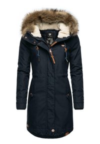 Navy parka jacket with a fur-trimmed hood, zip and buttons, adjustable waist, two front pockets, and a soft, textured lining.