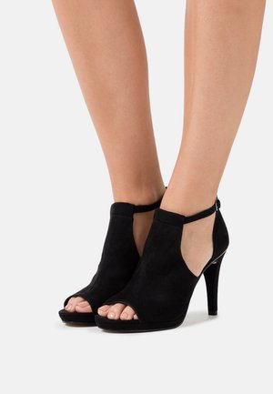 Peeptoe heels - black