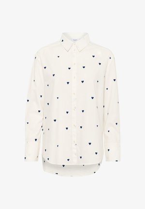 Witte button-up overhemd van katoen, met een patroon van kleine marineblauwe harten. Lange mouwen met knoopmanchetten en een afgeronde onderkant.