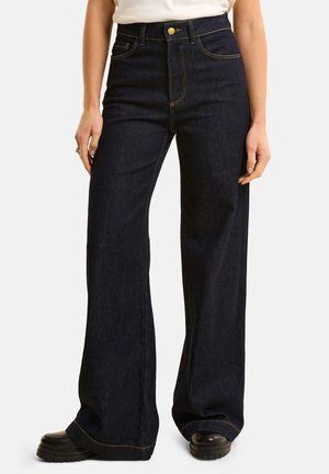 WITH BUTTONED POCKETS - Flared Jeans - navy blue