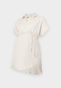 Maglietta da maternità a strisce beige e bianche, maniche corte, colletto, dettaglio del giro vita legato, tessuto fluido e orlo arrotondato per il massimo comfort.