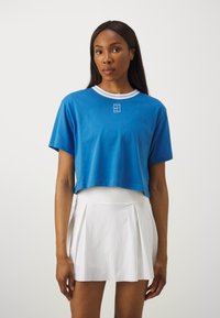 Nike Performance HERITAGE CROP TEE - Spordi T-särk - star blue