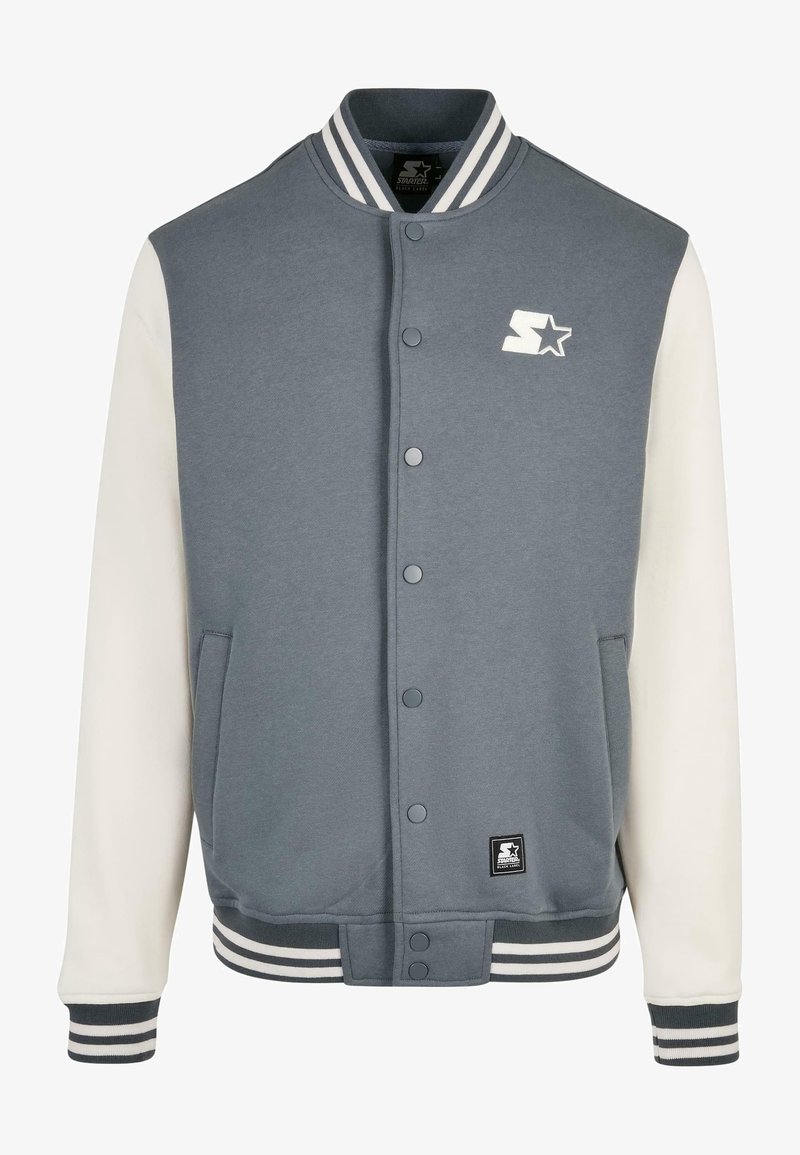 Veste universitaire grise et blanche avec boutons-pression, col et poignets rayés, poches avant et logo étoile blanc sur la poitrine.