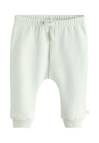 Pantalon en coton vert clair avec une taille élastique, un cordon décoratif et des poignets froncés. Texture lisse avec une finition douce.