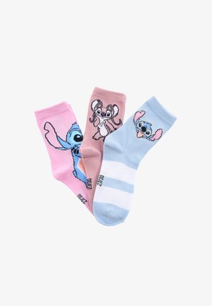 Tre paia di calzini: rosa con personaggio blu, marrone con un personaggio e azzurro a righe con un personaggio blu. Materiale in cotone misto.