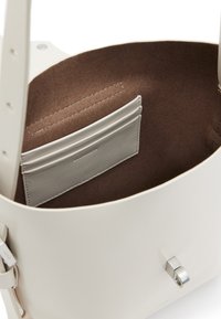 AllSaints MIRO CROSSBODY - Cross body bag - desert white