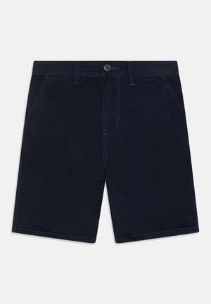 Granatowe szorty o prostym kroju, wykonane z tkaniny bawełnianej. Posiadają przednie kieszenie, zapięcie na guzik oraz kontrastowe szwy.