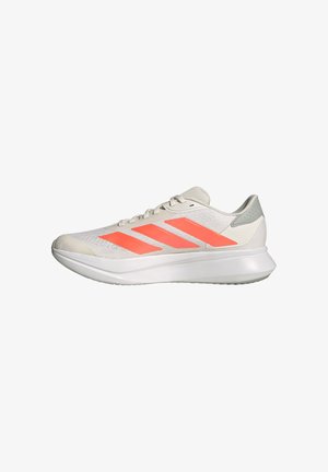 White running shoe with bright orange stripes, lace-up closure, and cushioned sole, shown from the side on a white background.